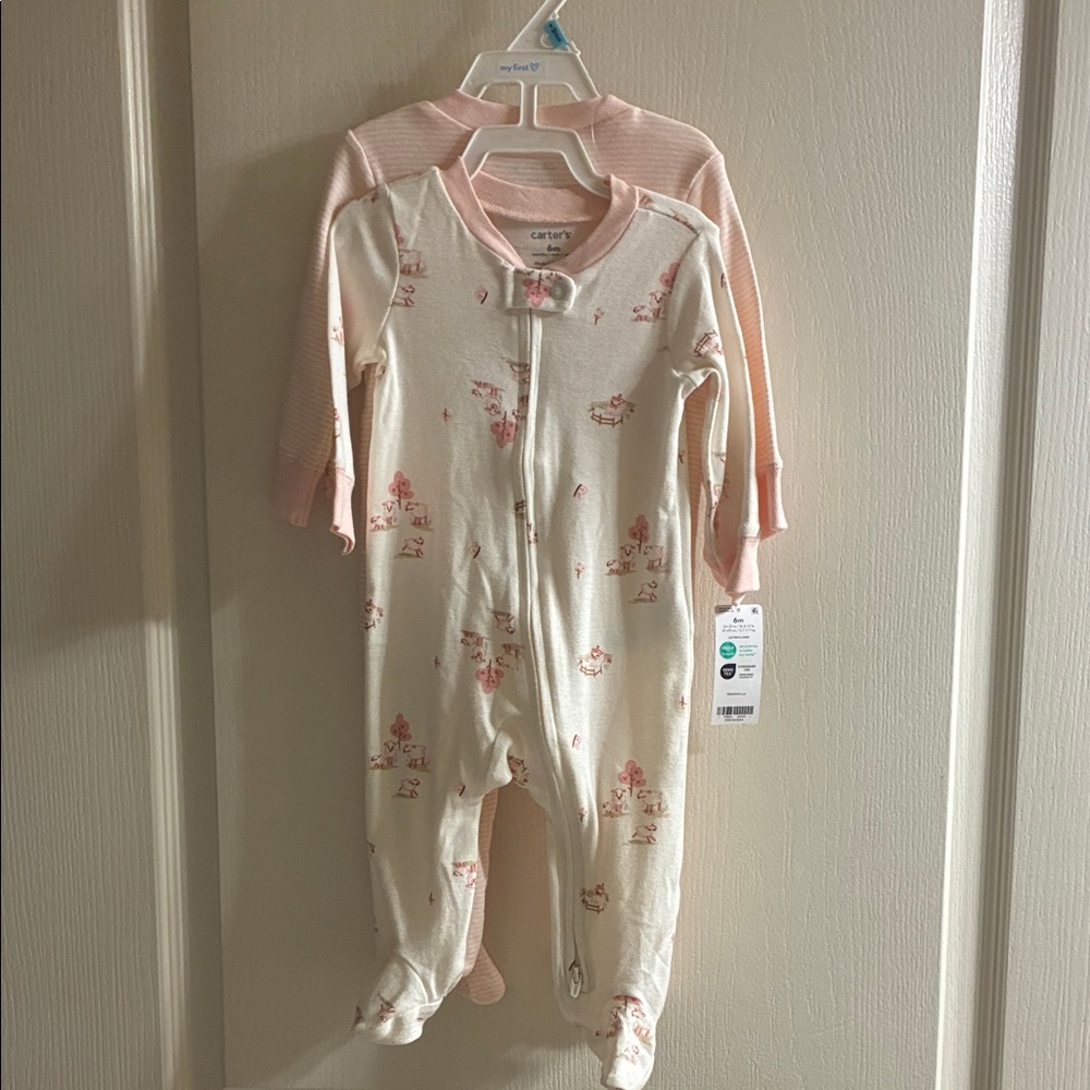Carter's Cream and Pink Floral Footie and one pink and cream pinstripe. Set of 2